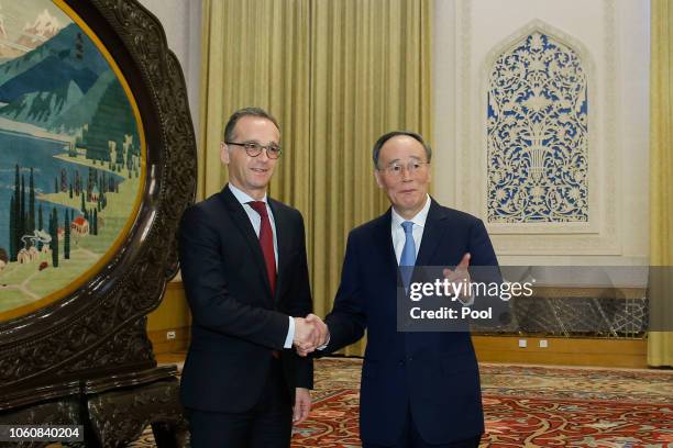 German Foreign Minister Heiko Mass meets Chinese Vice President Wang Qishan at the Great Hall of the People in Beijing, China, November 13, 2018....