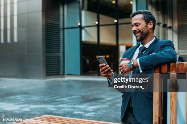 business on the move - southern european descent stock pictures, royalty-free photos & images