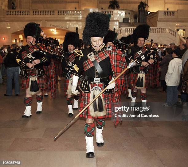 Members of the Pipes & Drums Firefighters Emerald Society of Westchester leave Grand Central Station enroute to the 245th Annual St. Patrick's Day...
