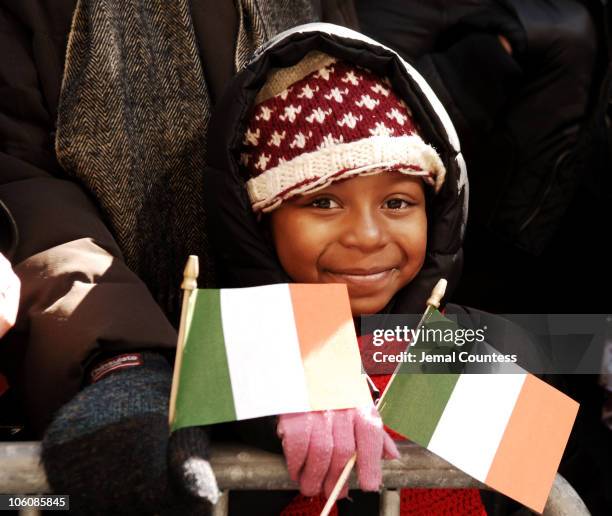 Young parade goer watches the 245th Annual St. Patrick's Day Parade on 5th Avenue in New York City on March 17, 2006