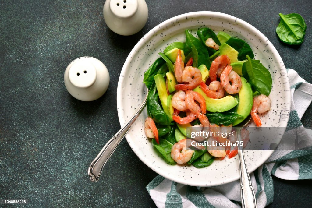 Avocado salad with baby spinach and shrimps