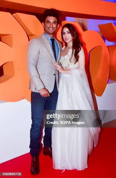 Sara Rajput Actor Sushant Singh Rajput and Sara Ali Khan pose for photos on the ...