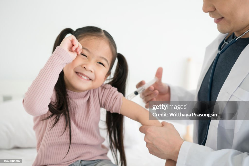 Dr Injecting Doctor Injecting Vaccination In Arm Of Asian Little Child Girl Healthy ...