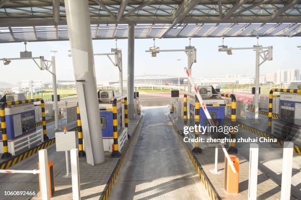 highway toll station - toll stock pictures, royalty-free photos & images