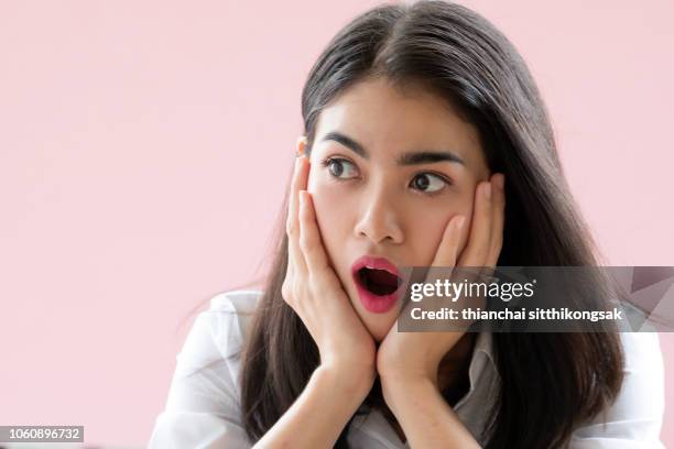 surprise face of beautiful lady - female open mouth stock pictures, royalty-free photos & images