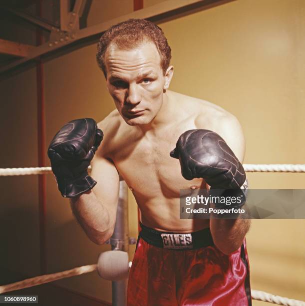 English heavyweight boxer Henry Cooper pictured during training in a boxing gym in England in December 1960. Current British and Commonwealth...