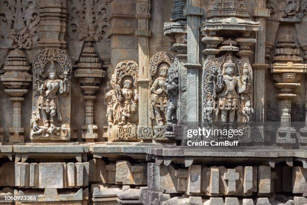 intricate carvings in belur chennakeshava temple premise. - soapstone carving stock pictures, royalty-free photos & images
