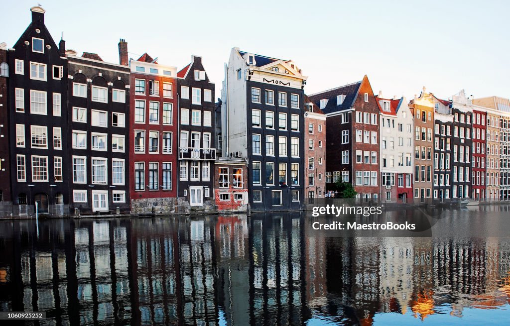 The Dancing Houses of the "Natte Damrak" of Amsterdam