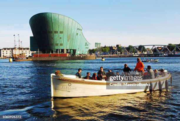 a great day on a boat tour with friends in amsterdam - nemo stock pictures, royalty-free photos & images