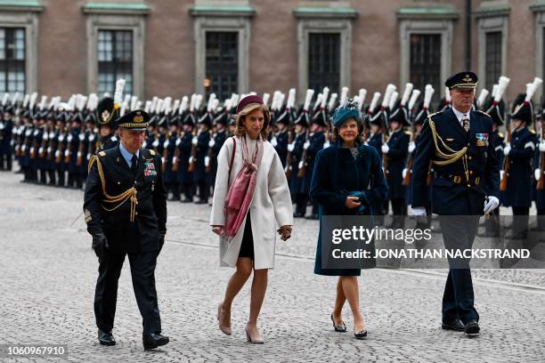 Laura Mattarella , daughter of the President of Italy, and Queen Silvia of Sweden review an honor guard on November 13, 2018 at the Royal Palace in...