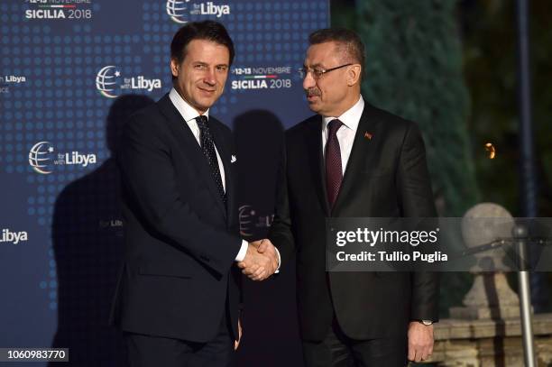 Italian Prime Minister Giuseppe Conte welcomes Fuat Oktay, Vice President of Turkey during the Conference for Libya at Villa Igiea on November 12,...