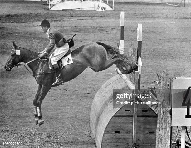 Show jumper Hans Günter Winkler on his mare "Halla" during the Olympic Games in Stockholm. He became Olympic Champion on the 17th of June in 1956....