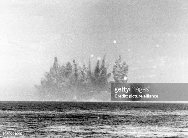 Development of a smoke cloud in the first second of the blasting of the fortifications on Helgoland on the 18th of April in 1947 at 1 p.m. A British...