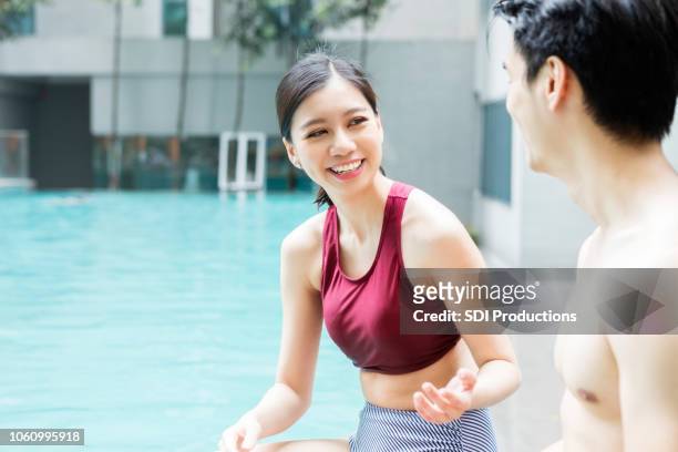 young couple relax on vacation - cool couple in apartment stock pictures, royalty-free photos & images