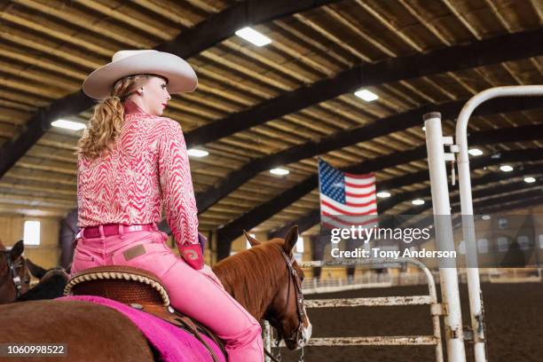 cowgirl pageant contestant riding her horse - pink hat stock pictures, royalty-free photos & images