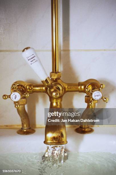 english bathroom tap - stylish bathroom colour stock pictures, royalty-free photos & images