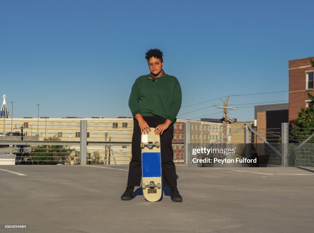 Woman with Her Skateboard