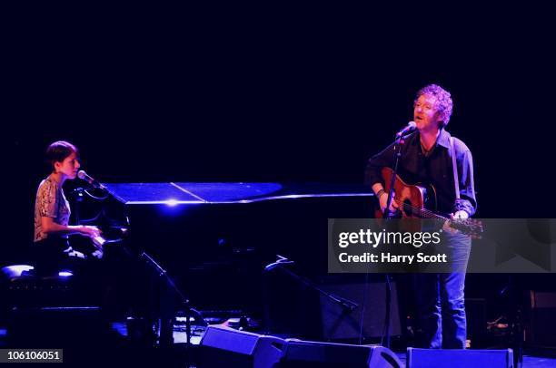 Marketa Irglova and Glen Hansard of Swell Season perform on stage at the Royal Festival Hall on October 26, 2010 in London, England.