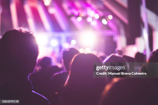 rock concert - head banging stock pictures, royalty-free photos & images