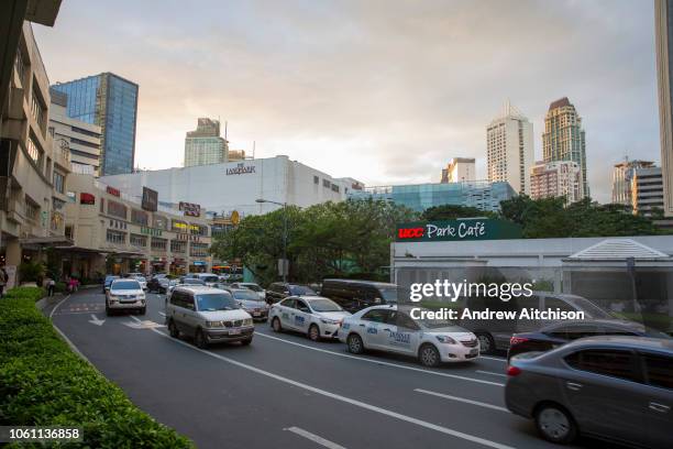 View of the Landmark Hotel beside Glorietta Mall on Palm Drive, Makati, Metro Manila, Philippines. At the side of the road, called Street Ayala, is a...