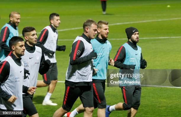 Omer Bayram and Serdar Aziz of Turkey attend a training session ahead of a UEFA Nations League Group 2 of League B soccer match against Sweden in...