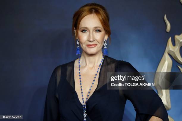 British author and screenwriter J.K. Rowling poses upon arrival to attend the UK premiere of the film 'Fantastic Beasts: The Crimes of Grindelwald'...