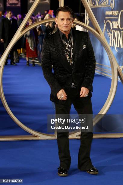 Johnny Depp attends the UK Premiere of "Fantastic Beasts: The Crimes Of Grindelwald" at Cineworld Leicester Square on November 13, 2018 in London,...