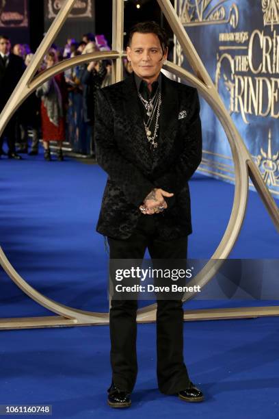 Johnny Depp attends the UK Premiere of "Fantastic Beasts: The Crimes Of Grindelwald" at Cineworld Leicester Square on November 13, 2018 in London,...