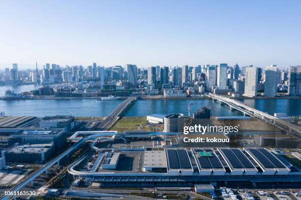 aerial photograph of urban solar power plant. - fake plant stock pictures, royalty-free photos & images