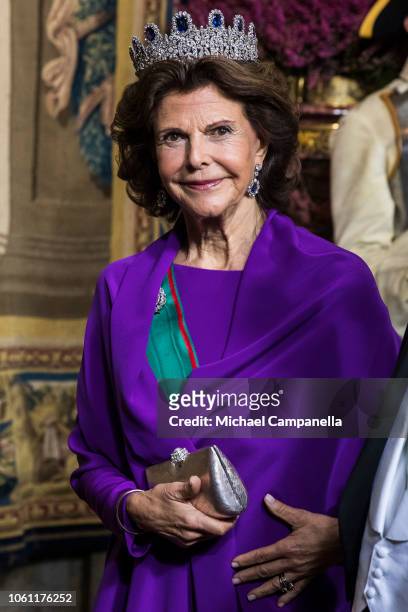 Queen Silvia of Sweden arrives at a gala dinner hosted by the Swedish royal family in connection with the state visit from the Italian president at...