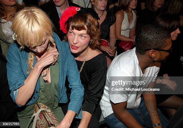 Carmen Hawk, Milla Jovovich and Usher during Olympus Fashion Week Spring 2007 - Y-3 - Front Row at Pier 40 in New York City, New York, United States.