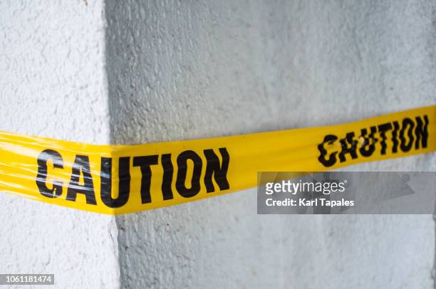 a yellow plastic cordon tape caution warning sign - keep out sign stock pictures, royalty-free photos & images
