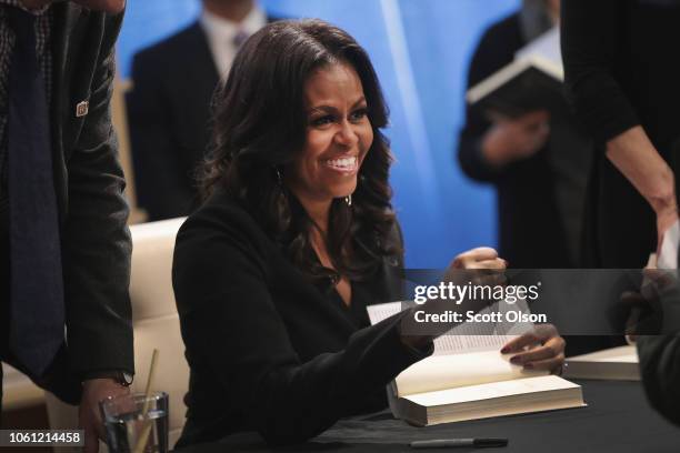 Former first lady Michelle Obama kicks off her Becoming book tour with a signing at the Seminary Co-op bookstore on November 13, 2018 in Chicago,...