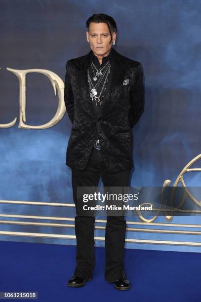 Johnny Depp attends the UK Premiere of "Fantastic Beasts: The Crimes Of Grindelwald" at Cineworld Leicester Square on November 13, 2018 in London,...