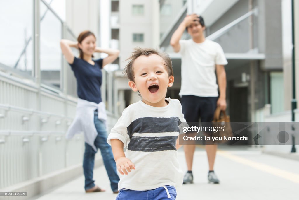 Running son, watching parents.