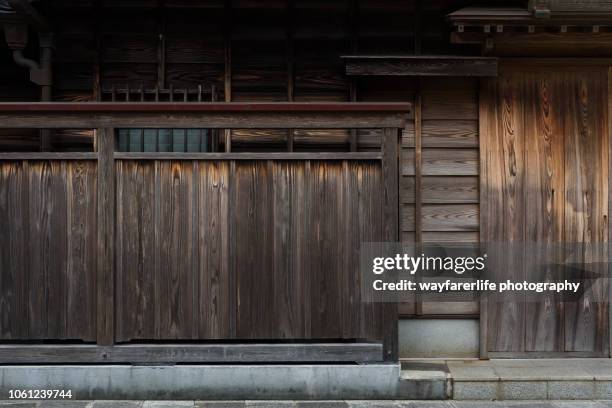 traditional style japanese wooden house - wood material architectural wall stock pictures, royalty-free photos & images