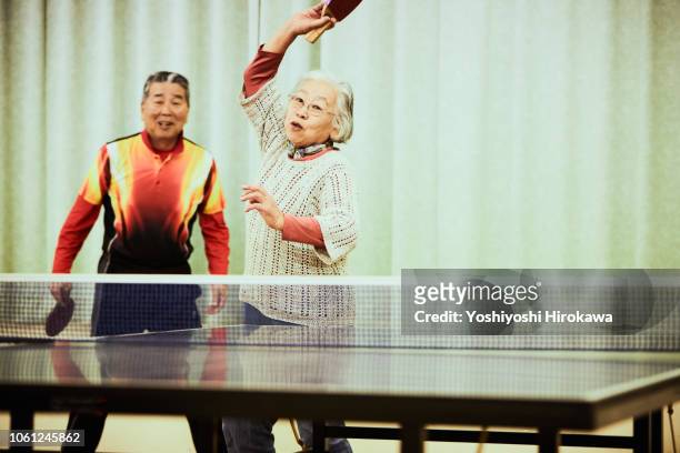 Senior playing table tennis