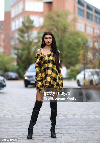 Ana Lisa Kohler wearing a black and yellow long shirt on October 28, 2018 in Berlin, Germany.