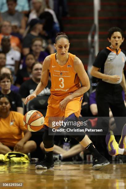 Diana Taurasi of the Phoenix Mercury handles the ball against the Seattle Storm uring game three of the WNBA Western Conference Finals at Talking...