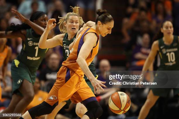 Diana Taurasi of the Phoenix Mercury handles the ball against the Seattle Storm uring game three of the WNBA Western Conference Finals at Talking...