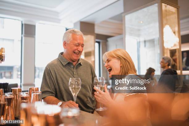 mature couple at a bar - 50s bar stock pictures, royalty-free photos & images