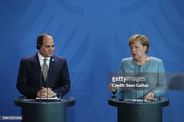 German Chancellor Angela Merkel and Egyptian President Abdel Fattah el-Sisi speak to the media following bilateral talks prior to the "Compact with...
