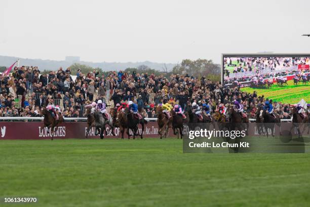 Jockeys compete the Race 4 Qatar Prix de l'Arc de Triomphe at ParisLongchamp racecourse on October 7, 2018 in Paris, France.