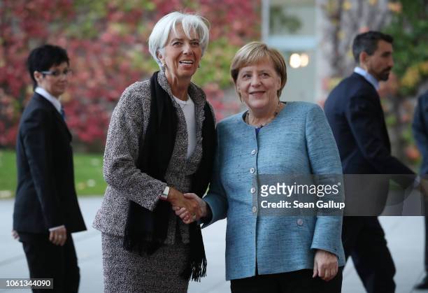 German Chancellor Angela Merkel greets International Monetary Fund head Christine Lagarde at the Chancellery during the "Compact with Africa"...