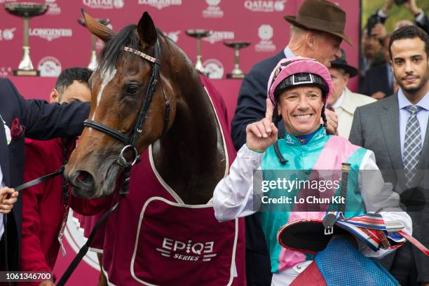 Frankie Dettori celebrates after Enable winning the 97th Qatar Prix de l'Arc de Triomphe at ParisLongchamp Racecourse on October 7, 2018 in France.