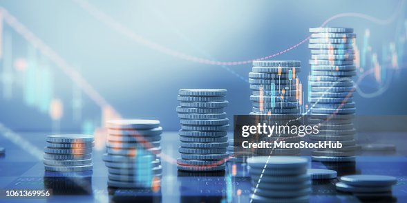 Chart With Coin Stack Coin Stacks And Chart Graphs On A Chessboard High-Res Stock Photo ...