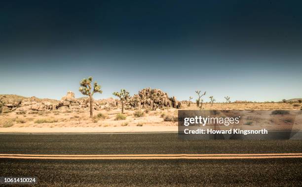 road desert and sky, horizontal view - josuabaum stock-fotos und bilder