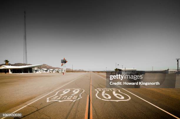 route 66 road signage on highway - amboy california stock-fotos und bilder