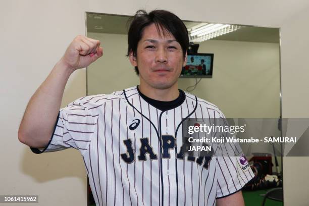 Catcher Takuya Kai of Japan poses for photographs after the game five between Japan and MLB All Stars at Nagoya Dome on November 14, 2018 in Nagoya,...