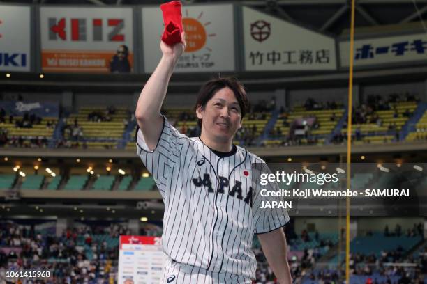 Catcher Takuya Kai of Japan applauds fans after the game five between Japan and MLB All Stars at Nagoya Dome on November 14, 2018 in Nagoya, Aichi,...